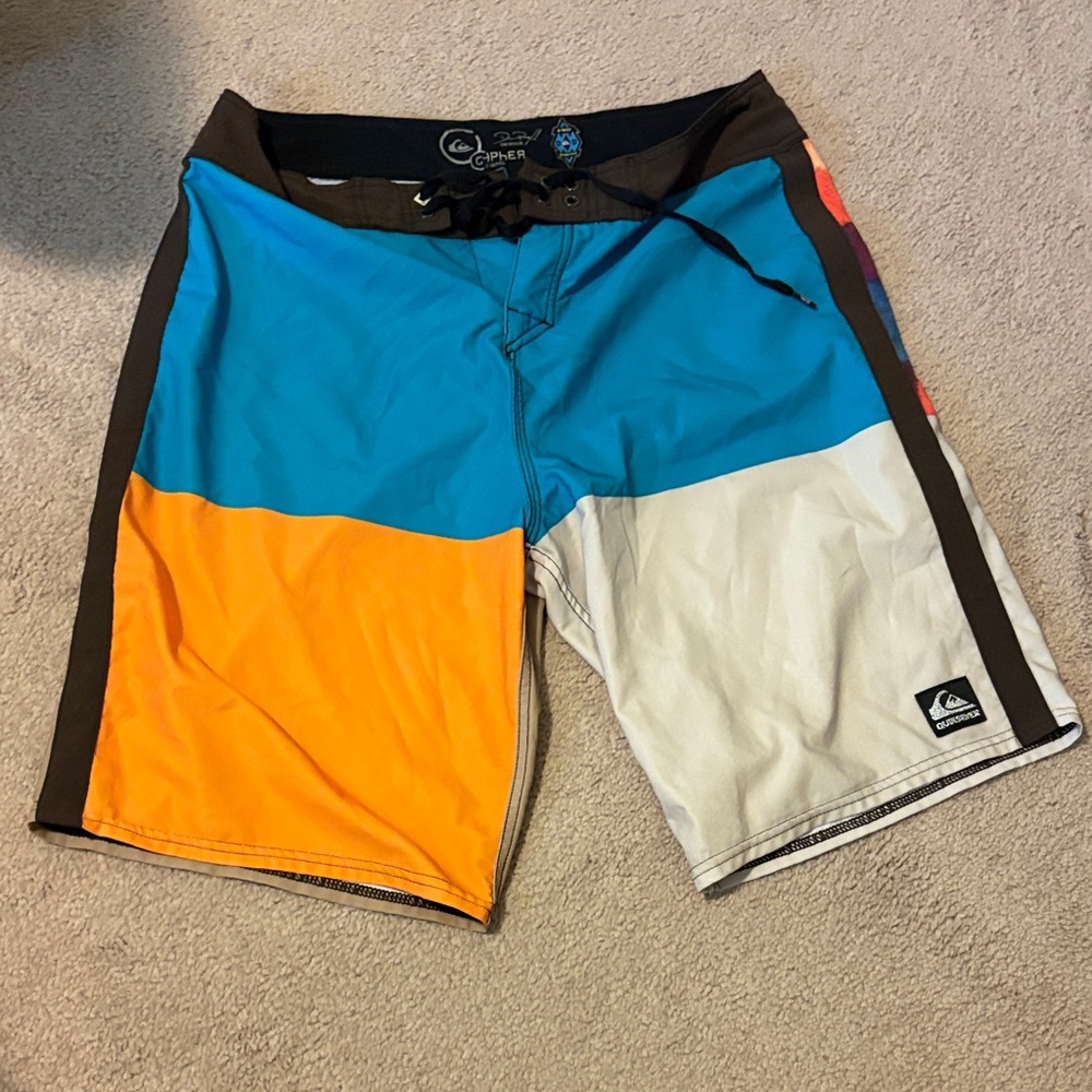 Quiksilver Blue, Orange, and White Board Shorts: never worn